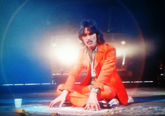 Magical Mystery Tour: film still, George Harrison playing chalk organ 1967