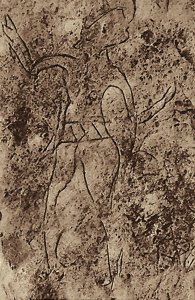 Human figure with hands upraised perhaps in a dance. Incised into the paving-stones at Megiddo.