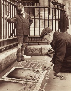 (watched by little Albert Elliot) George Hurd at his pitch outside the National Portrait Gallery, London 1952 
